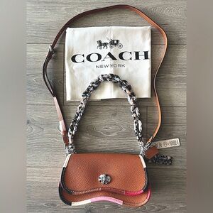Coach Pebbled Leather Colorblock Saddle Crossbody Bag - Brown/Pink